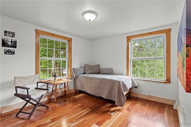 bedroom with light wood-type flooring