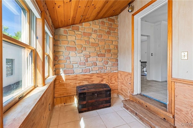 interior space featuring wood ceiling and vaulted ceiling