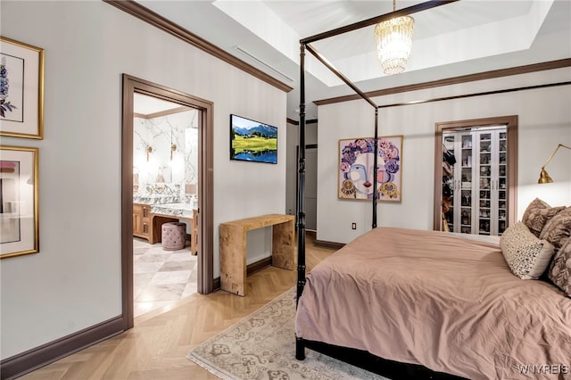 bedroom featuring light parquet flooring and a chandelier