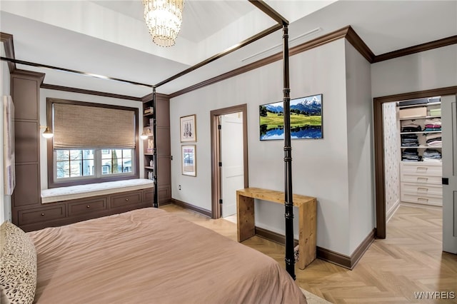 bedroom with an inviting chandelier, ornamental molding, and light parquet flooring