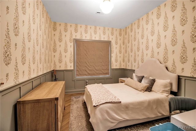 bedroom featuring dark hardwood / wood-style floors