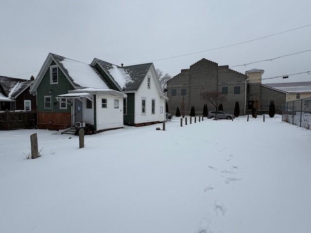 view of snow covered property