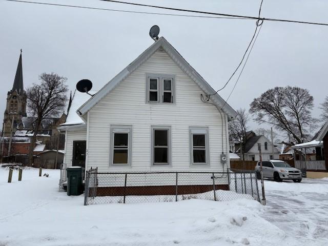 view of snow covered property