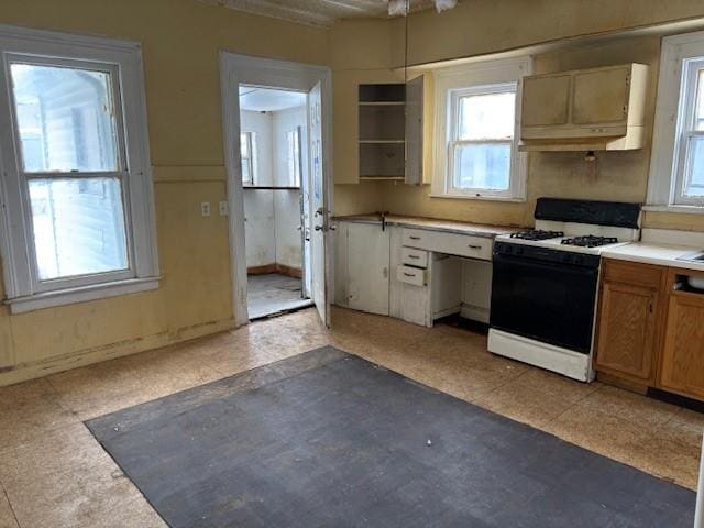 kitchen featuring range with gas cooktop