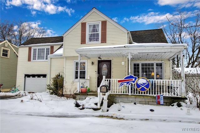 view of front of home with a porch and a garage