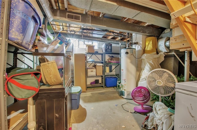 storage area featuring water heater