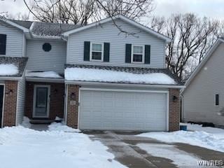 front of property with a garage