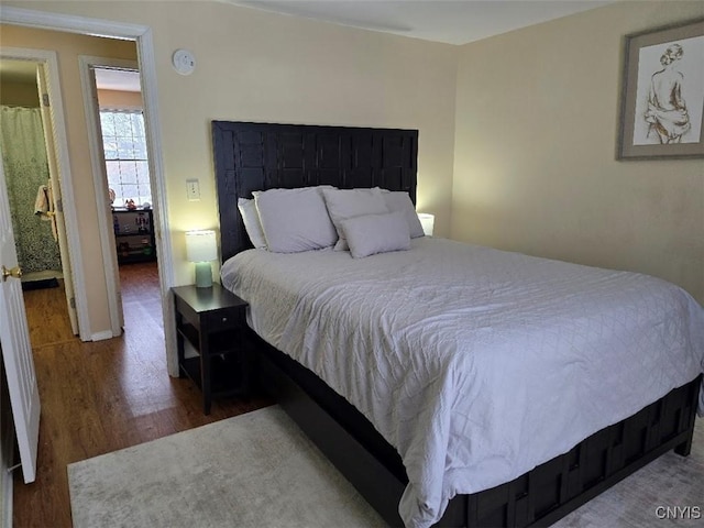 bedroom featuring hardwood / wood-style flooring