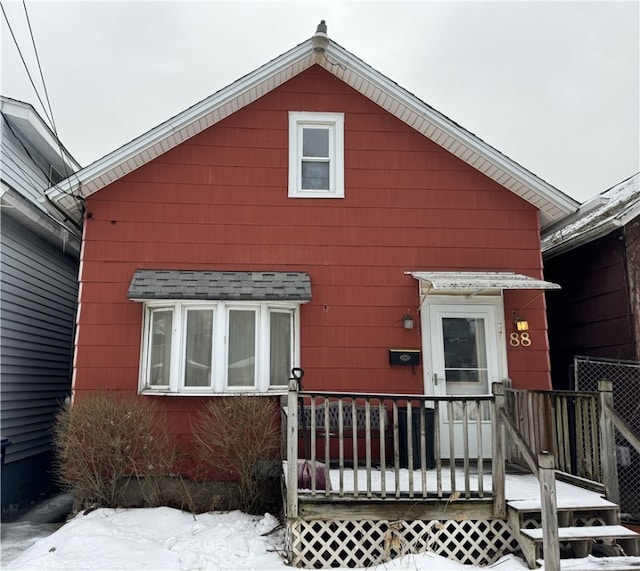 view of snow covered house