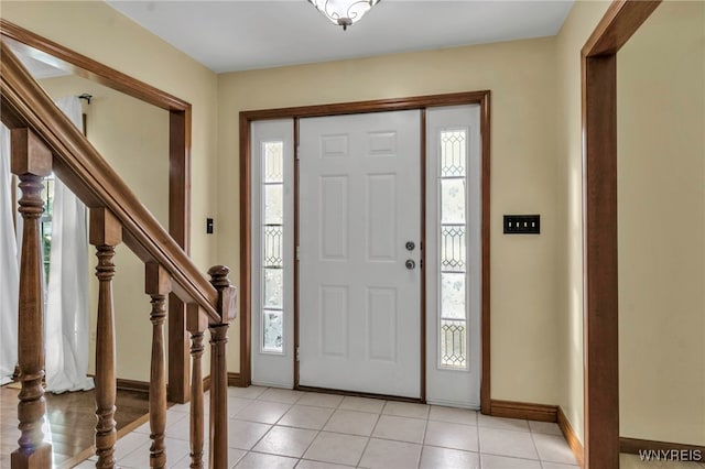 entrance foyer featuring light tile patterned floors