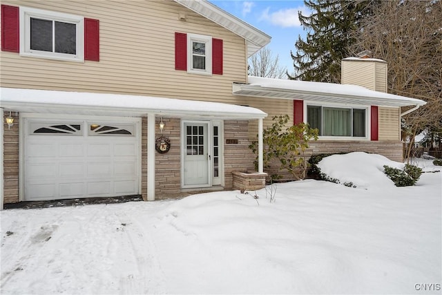 view of front of home with a garage