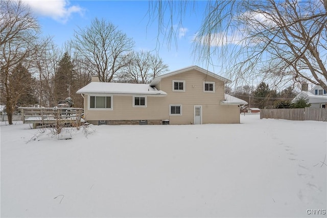 view of snow covered property