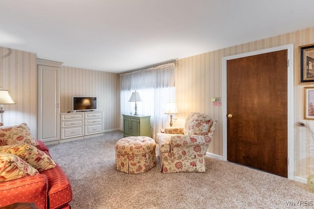 sitting room featuring carpet floors