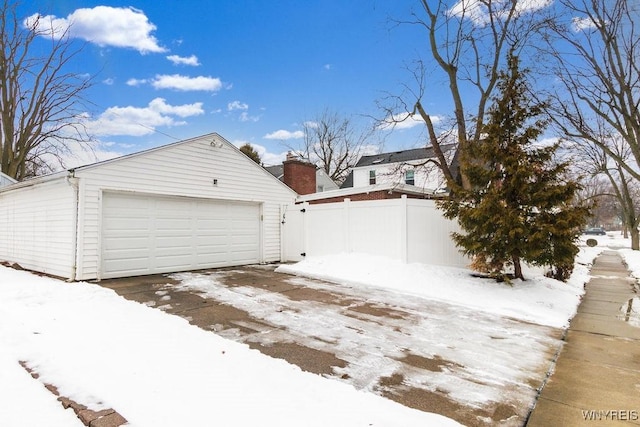 view of snow covered garage