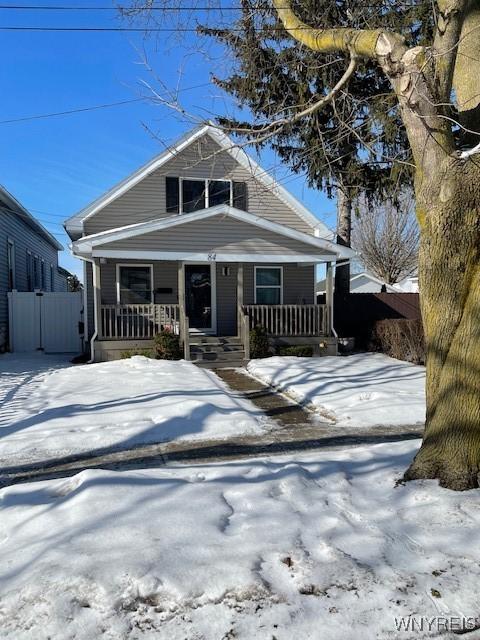 bungalow-style home with a porch