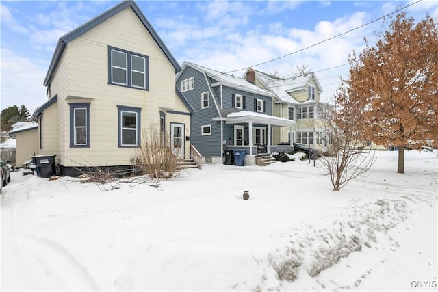 view of snow covered property