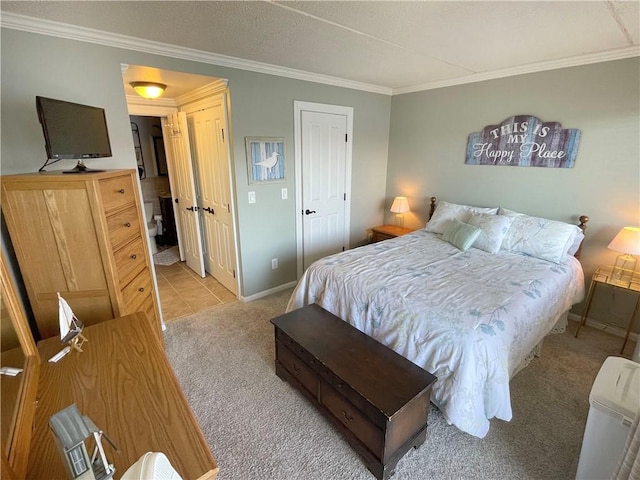 carpeted bedroom with ornamental molding