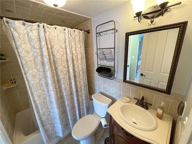 full bathroom featuring toilet, tile walls, vanity, shower / bath combination with curtain, and backsplash