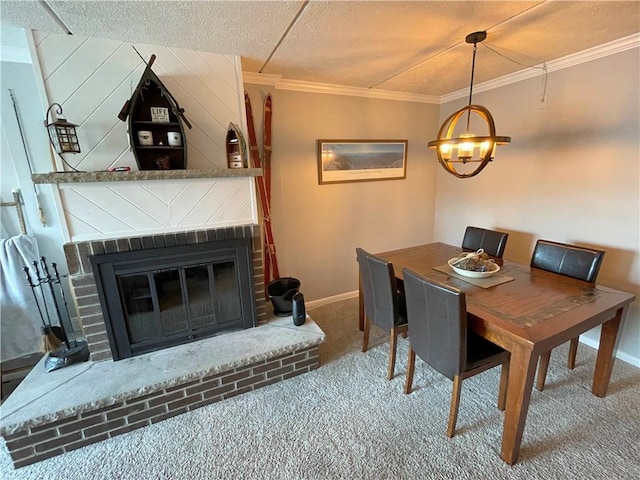 carpeted dining space with crown molding, a fireplace, and a textured ceiling