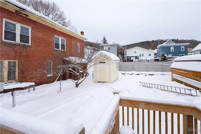 20 Petrie St, Little Falls-City, NY 13365 - yard covered in snow featuring a shed