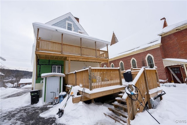 20 Petrie St, Little Falls-City, NY 13365 - snow covered house featuring a balcony and a deck