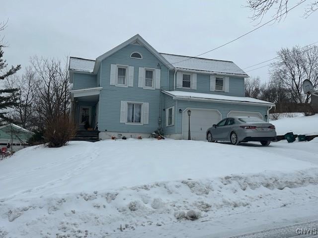 front facade with a garage