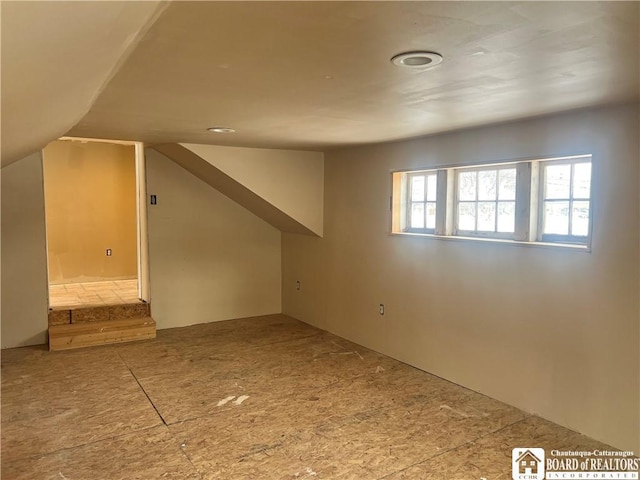 bonus room with lofted ceiling