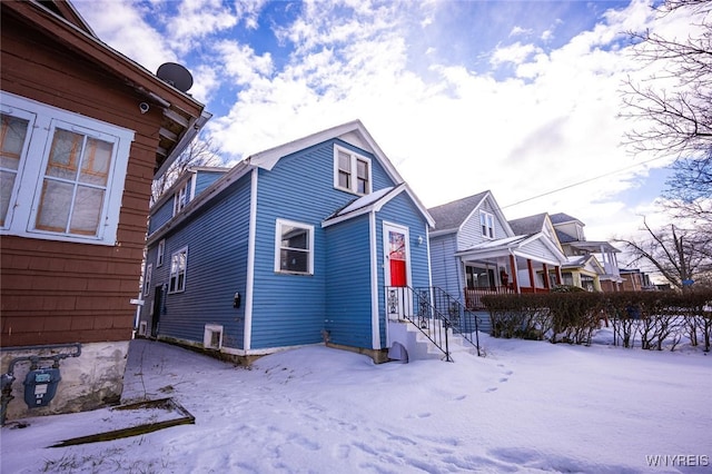 view of snow covered property