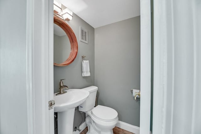 7 Cliffside Dr, South Bristol, NY 14424 - bathroom with toilet and hardwood / wood-style floors