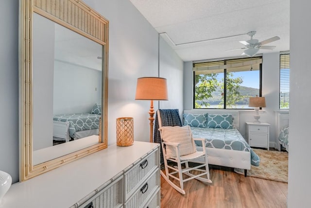 7 Cliffside Dr, South Bristol, NY 14424 - bedroom featuring hardwood / wood-style floors and a textured ceiling