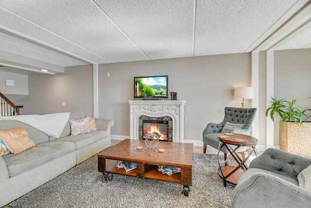7 Cliffside Dr, South Bristol, NY 14424 - living room featuring a premium fireplace and a textured ceiling