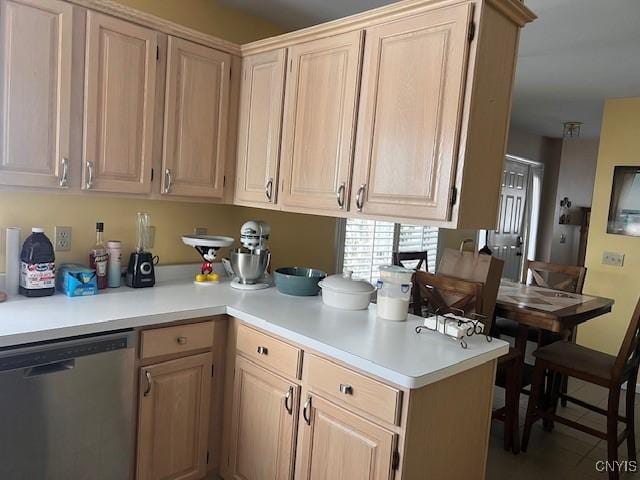 kitchen with dishwasher, light brown cabinets, and kitchen peninsula