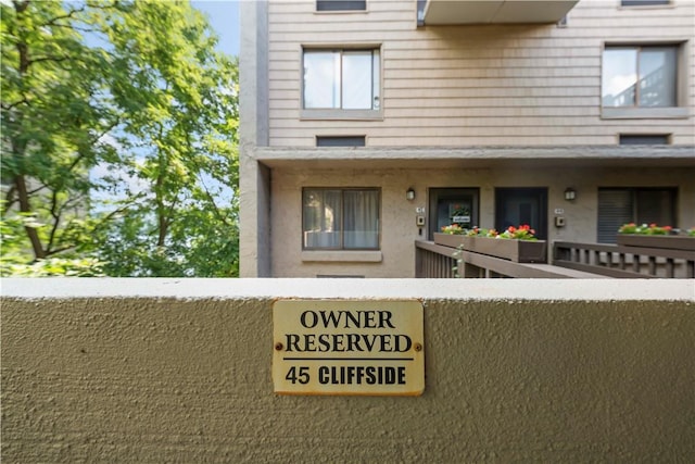 view of front of home with a balcony