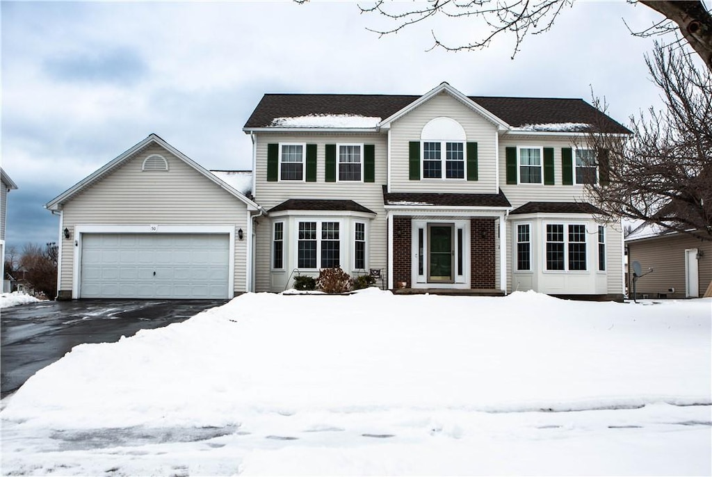 view of front of property featuring a garage