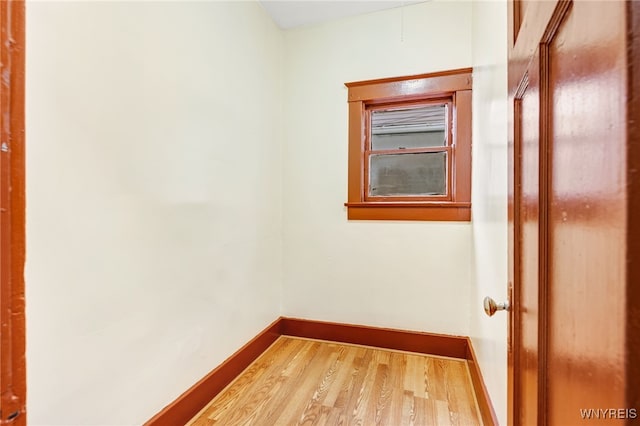 spare room featuring hardwood / wood-style flooring