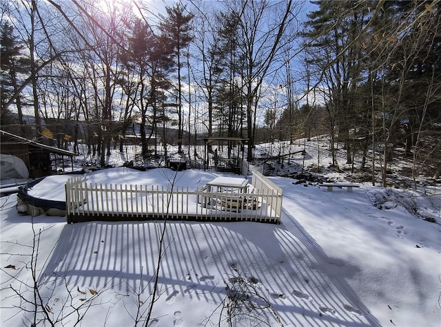 view of snow covered deck