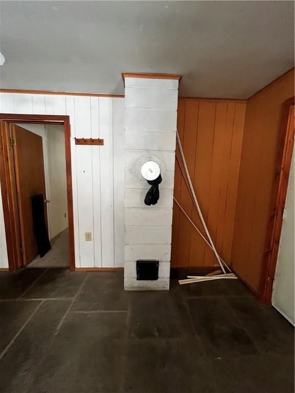 bathroom with wood walls