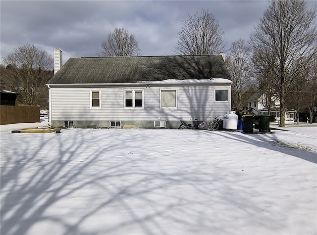 view of snow covered house