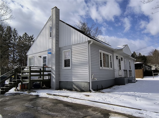 view of snow covered property