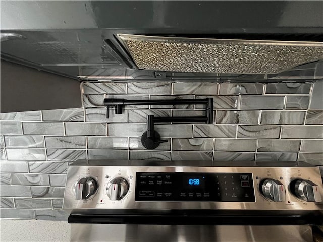 room details featuring stainless steel range with electric stovetop