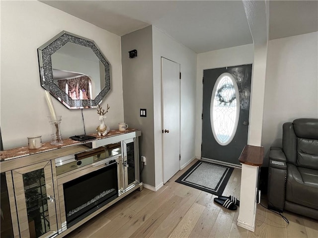 foyer entrance featuring light hardwood / wood-style floors