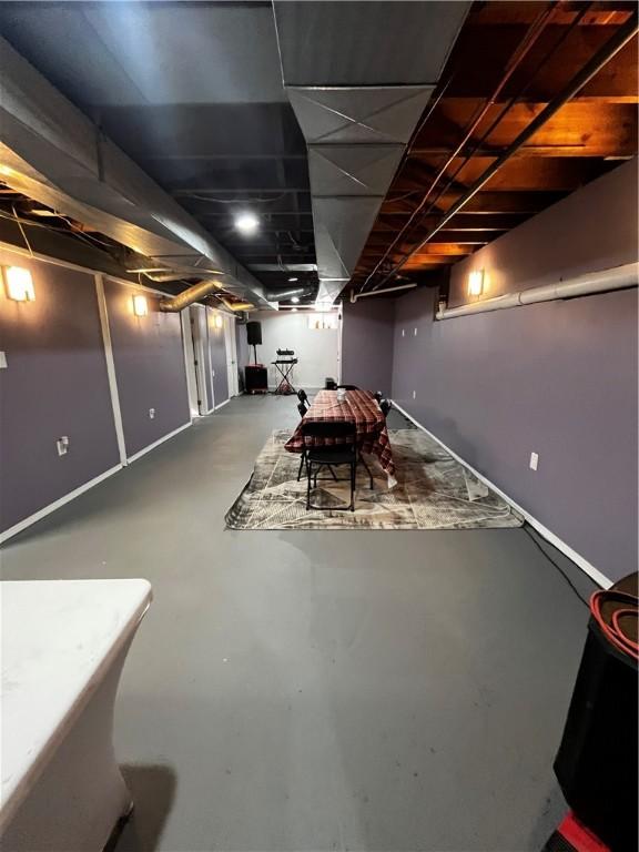 49 Lewis St, Maine, NY 13760 - below grade area featuring baseboards