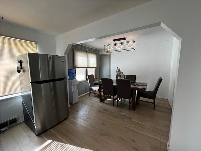 dining room featuring light hardwood / wood-style floors