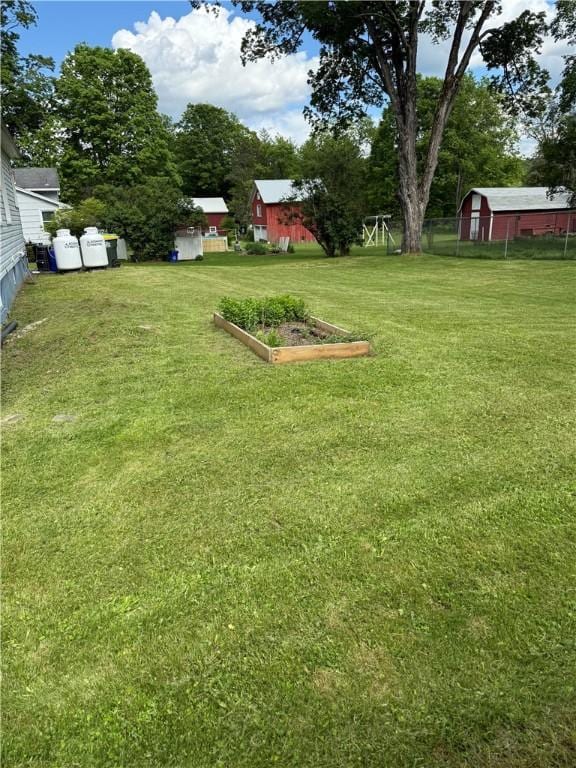 49 Lewis St, Maine, NY 13760 - view of yard featuring a garden