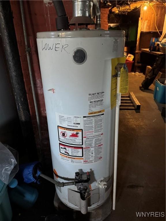 utility room with water heater