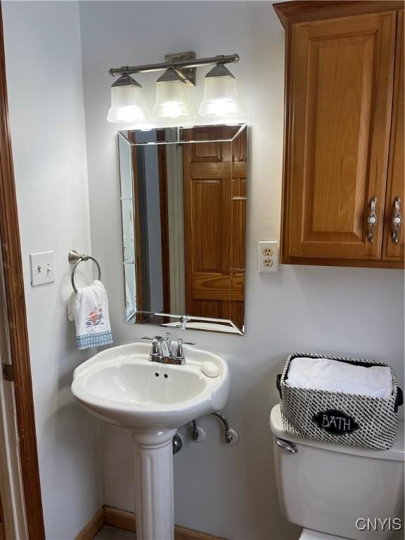 bathroom featuring toilet