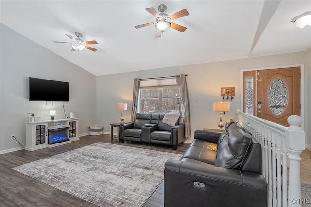 living room with lofted ceiling, dark hardwood / wood-style floors, and ceiling fan