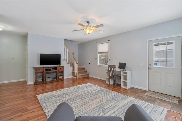 living room with ceiling fan and hardwood / wood-style floors