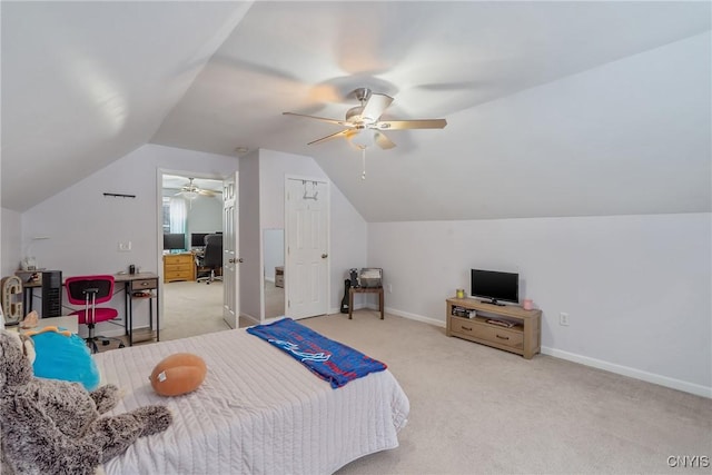 carpeted bedroom with lofted ceiling and ceiling fan