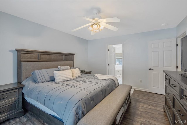 bedroom featuring dark wood-type flooring, connected bathroom, and ceiling fan